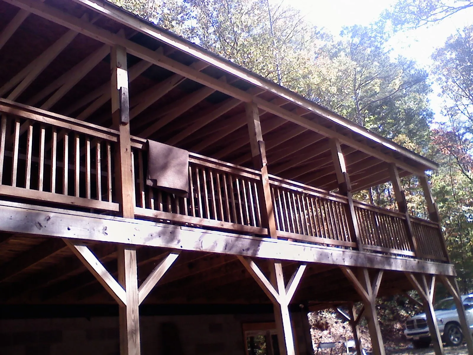 Timber framing under a new elevated porch and deck — Roof Leak Repair in Summit Lake by Roofing Brothers